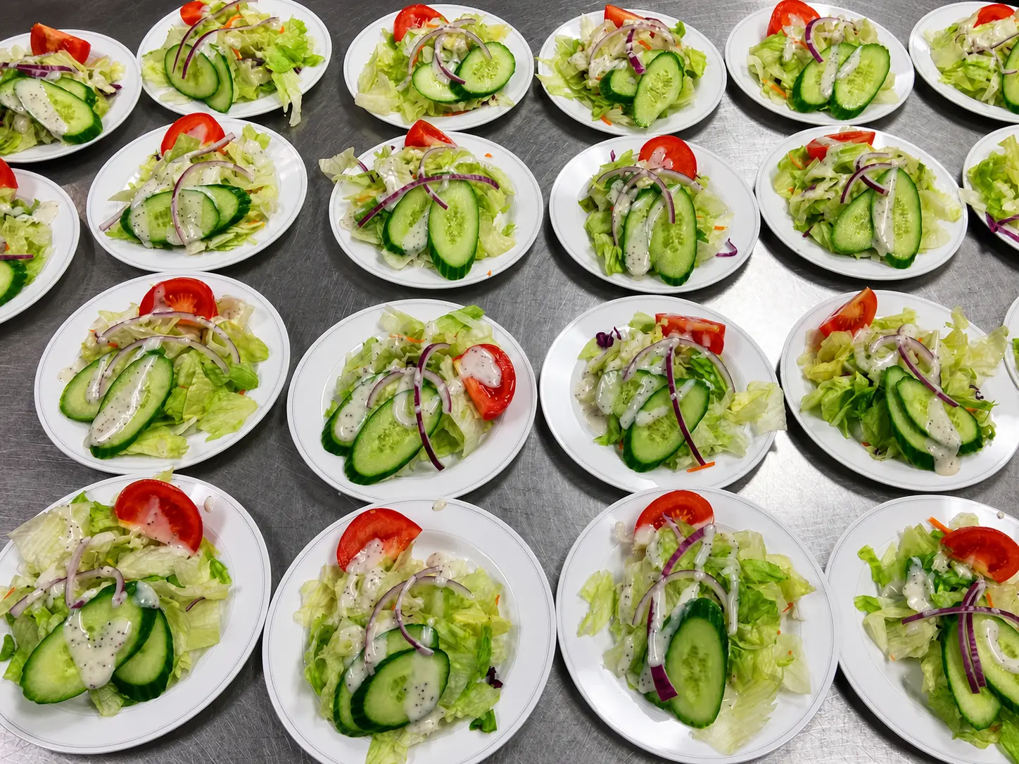 Salads prepared for guests at an H WAY kosher group event